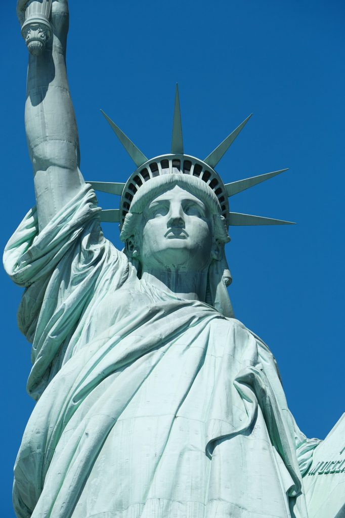 Statue of Liberty detail in a sunny day, blue sky in New York